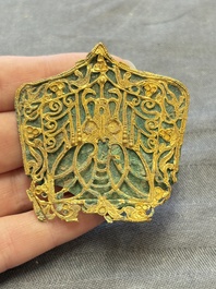 A fine Chinese gold and bronze plaque from a hat ornament, Wei/Jin