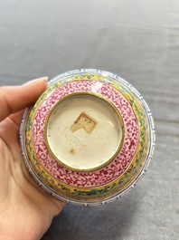 A pair of Chinese yellow-ground Canton enamel covered bowls and two cups, Yongzheng/Qianlong