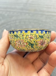 A pair of Chinese yellow-ground Canton enamel covered bowls and two cups, Yongzheng/Qianlong