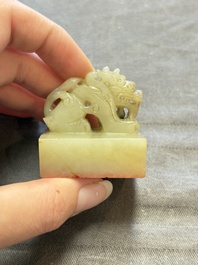 A Chinese celadon and russet jade 'dragon' seal, 18/19th C.