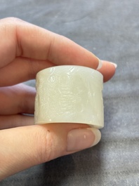A fine Chinese white jade inscribed archer ring, Zigang 子岡 mark, 18th C.