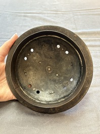 An unusual Chinese gold- and silver-inlaid iron censer and cover, Xuande mark, Ming
