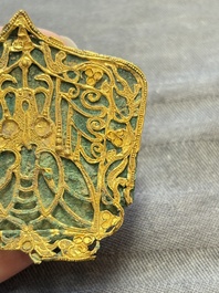 A fine Chinese gold and bronze plaque from a hat ornament, Wei/Jin