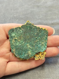 A fine Chinese gold and bronze plaque from a hat ornament, Wei/Jin