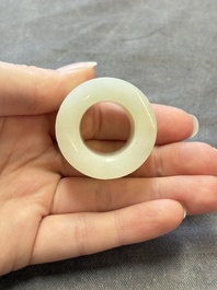 A fine Chinese white jade inscribed archer ring, Zigang 子岡 mark, 18th C.
