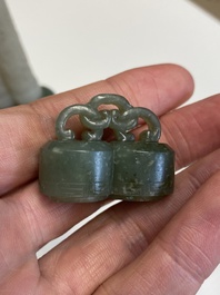 A Chinese reticulated white jade parfumier with spinach-green jade cover and base, Qing