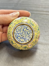 A pair of Chinese yellow-ground Canton enamel covered bowls and two cups, Yongzheng/Qianlong