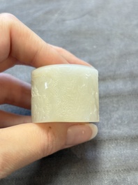 A fine Chinese white jade inscribed archer ring, Zigang 子岡 mark, 18th C.
