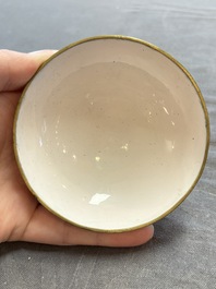 A pair of Chinese yellow-ground Canton enamel covered bowls and two cups, Yongzheng/Qianlong