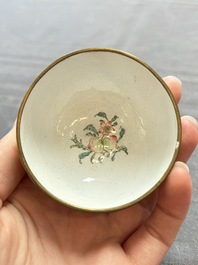 A pair of Chinese yellow-ground Canton enamel covered bowls and two cups, Yongzheng/Qianlong