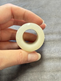 A fine Chinese white jade inscribed archer ring, Zigang 子岡 mark, 18th C.