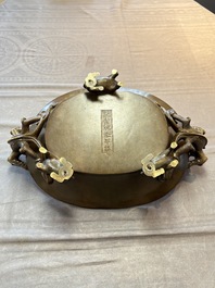 A large Chinese bronze basin with chilong handles, Qianlong mark, 20th C.