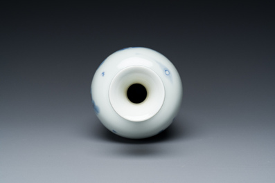 A Chinese blue, white and copper-red 'magpie and prunus' vase, Kangxi mark, 19/20th C.
