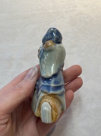 Two Chinese blue, white and celadon biscuit 'Shoulao' and 'Zhongli Quan' water droppers, Qianlong
