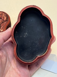 A fine Chinese red cinnabar lacquer ruyi-form 'Ba Man Xian Bao 八蠻獻寶' box and cover, Qianlong