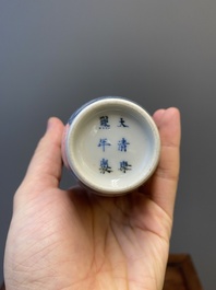 A Chinese blue, white and copper-red 'magpie and prunus' vase, Kangxi mark, 19/20th C.