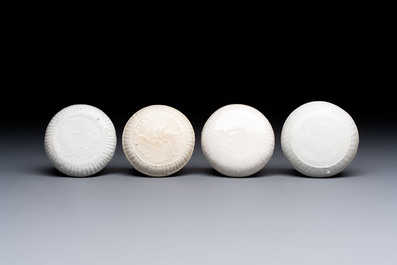 Nine Chinese white-glazed boxes and covers with incised floral design from the Jepara shipwreck, Dehua or Anxi kiln, Song