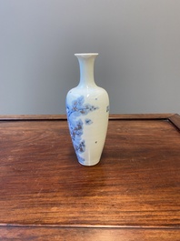 A Chinese blue, white and copper-red 'magpie and prunus' vase, Kangxi mark, 19/20th C.