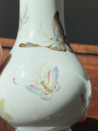 A Chinese famille rose 'riverscape' vase and a 'butterfly' vase, 20th C.