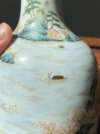 A Chinese famille rose 'riverscape' vase and a 'butterfly' vase, 20th C.