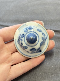 A varied collection of eight Chinese blue and white vases, two teapots and two loving cups, Kangxi/Qianlong