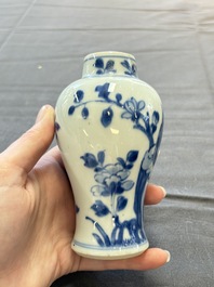 A varied collection of eight Chinese blue and white vases, two teapots and two loving cups, Kangxi/Qianlong