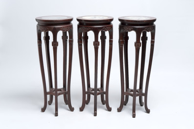 Five Chinese marble-topped hongmu stands, 20th C.