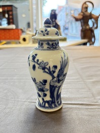 A varied collection of eight Chinese blue and white vases, two teapots and two loving cups, Kangxi/Qianlong