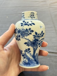 A varied collection of eight Chinese blue and white vases, two teapots and two loving cups, Kangxi/Qianlong