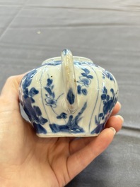 A varied collection of eight Chinese blue and white vases, two teapots and two loving cups, Kangxi/Qianlong