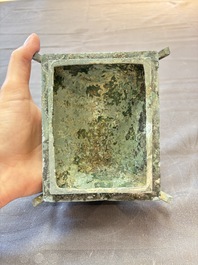 A Chinese archaic bronze inscribed wine vessel with buffalo design, 'fangyi 方彝', Western Zhou