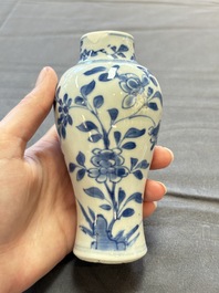 A varied collection of eight Chinese blue and white vases, two teapots and two loving cups, Kangxi/Qianlong
