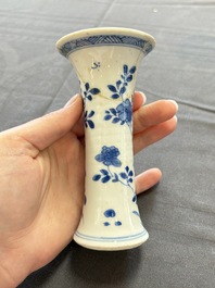 A varied collection of eight Chinese blue and white vases, two teapots and two loving cups, Kangxi/Qianlong