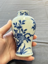 A varied collection of eight Chinese blue and white vases, two teapots and two loving cups, Kangxi/Qianlong