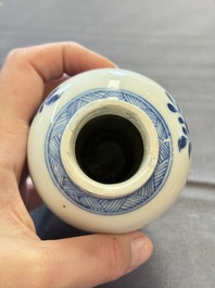 A varied collection of eight Chinese blue and white vases, two teapots and two loving cups, Kangxi/Qianlong