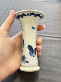 A varied collection of eight Chinese blue and white vases, two teapots and two loving cups, Kangxi/Qianlong
