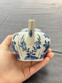 A varied collection of eight Chinese blue and white vases, two teapots and two loving cups, Kangxi/Qianlong