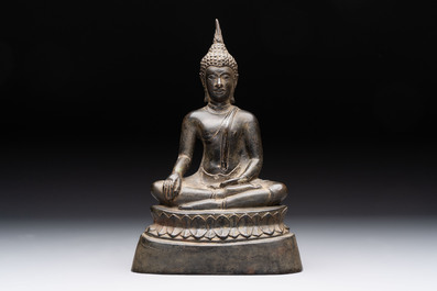 A Thai Buddha, a Sino-Tibetan bronze Bodhisattva and a Tibetan bronze and iron phurba, 18/19th C.