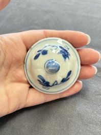 A varied collection of eight Chinese blue and white vases, two teapots and two loving cups, Kangxi/Qianlong
