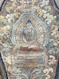 A framed Tibetan silk-embroidered four-leaf ritual crown with Transcendent Buddhas, 18th C.