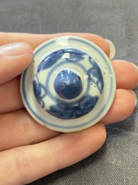 A varied collection of eight Chinese blue and white vases, two teapots and two loving cups, Kangxi/Qianlong