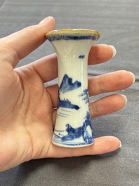 A varied collection of eight Chinese blue and white vases, two teapots and two loving cups, Kangxi/Qianlong