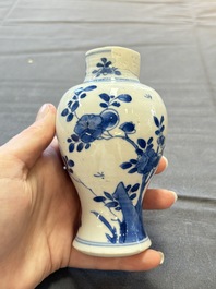 A varied collection of eight Chinese blue and white vases, two teapots and two loving cups, Kangxi/Qianlong
