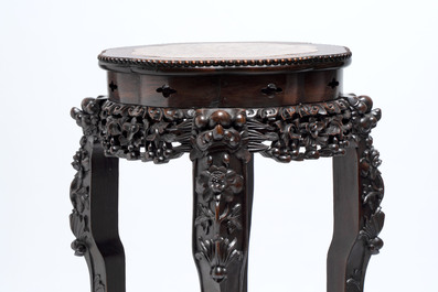 Two Chinese marble-topped hongmu stands, 19th C.