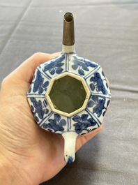 A varied collection of eight Chinese blue and white vases, two teapots and two loving cups, Kangxi/Qianlong