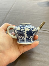 A varied collection of eight Chinese blue and white vases, two teapots and two loving cups, Kangxi/Qianlong