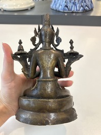 A Thai Buddha, a Sino-Tibetan bronze Bodhisattva and a Tibetan bronze and iron phurba, 18/19th C.