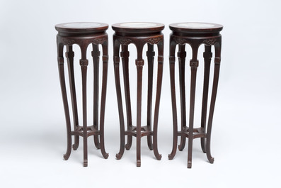 Five Chinese marble-topped hongmu stands, 20th C.