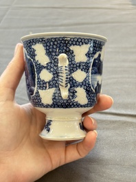 A varied collection of eight Chinese blue and white vases, two teapots and two loving cups, Kangxi/Qianlong