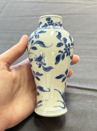 A varied collection of eight Chinese blue and white vases, two teapots and two loving cups, Kangxi/Qianlong